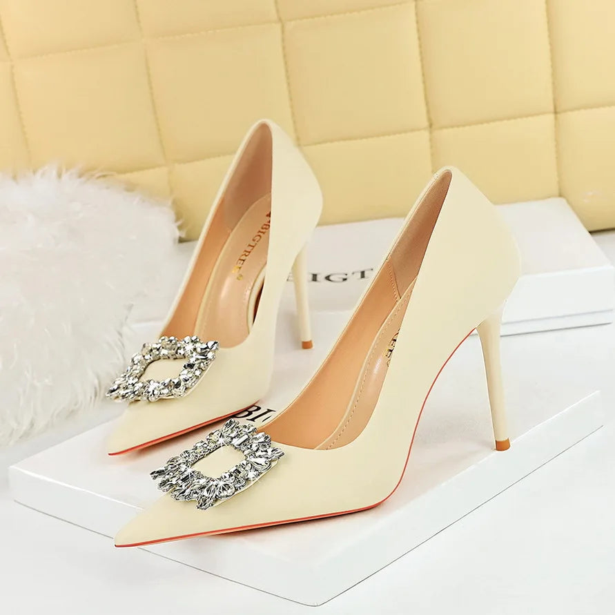 rhinestone buckle heel pumps